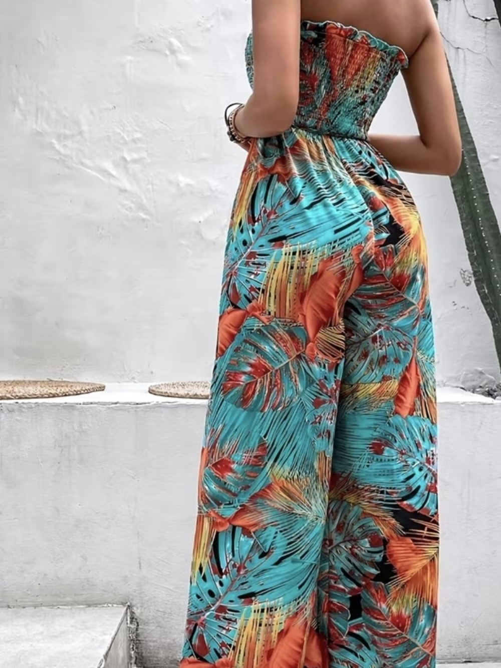 Smocked Strapless Wide-Leg Jumpsuit in Teal & Orange Tropical Print